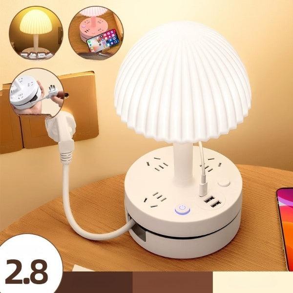 a white lamp sitting on top of a wooden table