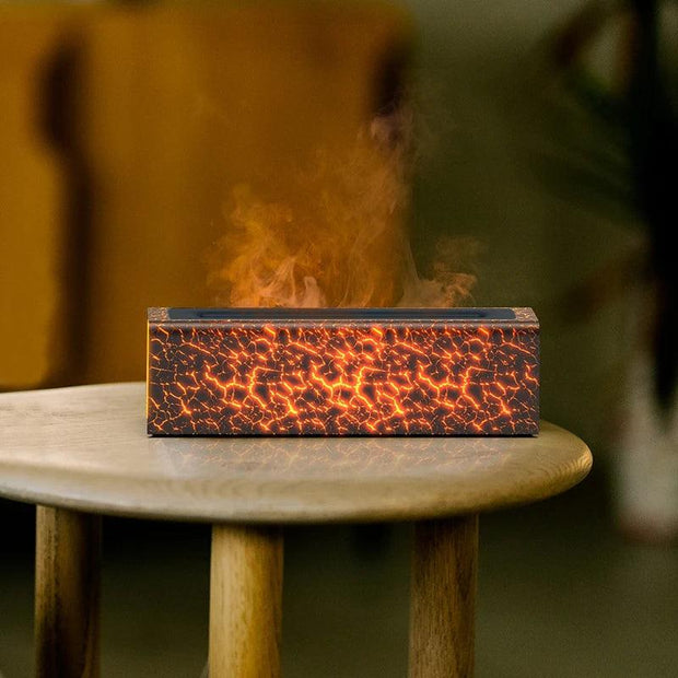 a wooden table topped with a burning speaker