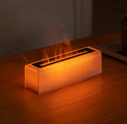 a fire humidifier sitting on top of a wooden table